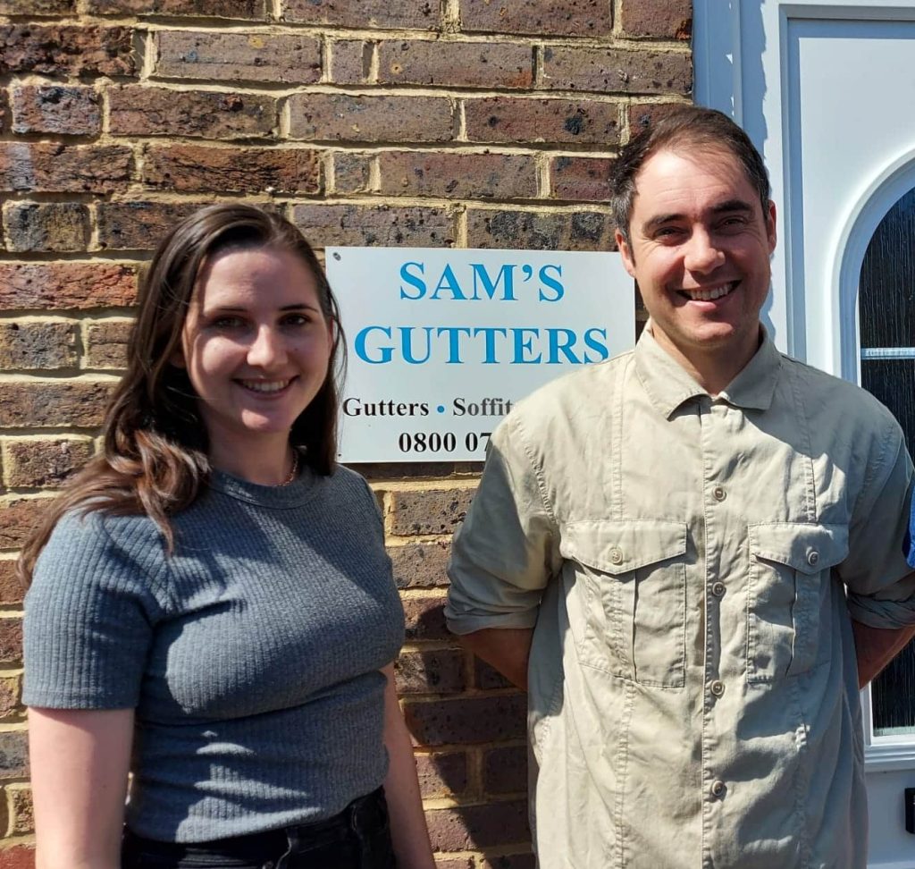 team at Sam's Gutters office